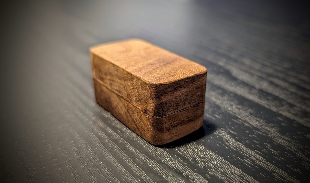 Stylish travel kit, including a toothbrush travel case, razor case, and floss case. Made from real walnut wood, perfect gift for a traveler